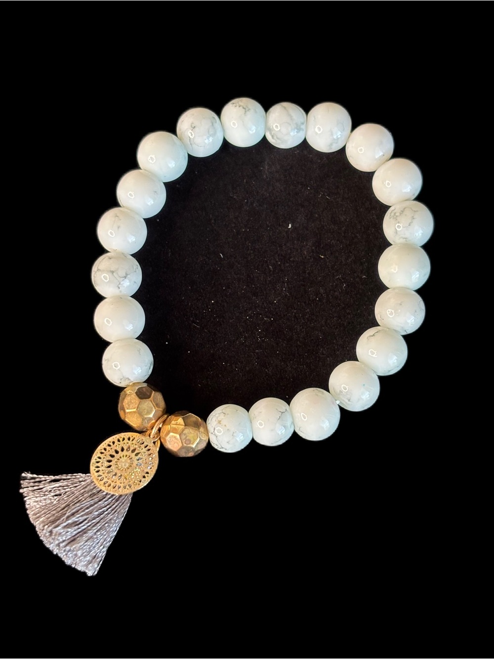 White Howlite Beaded Bracelet with Gold Accents and Gray Tassel